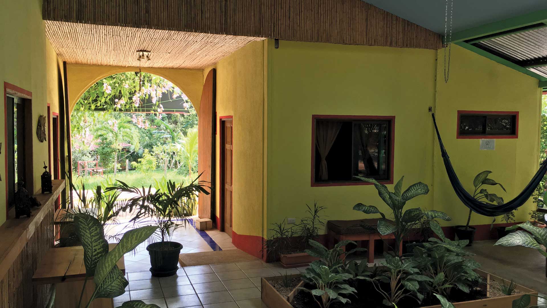Main entrance and indoor gardens and boutique hotel in Playa Grande, Costa Rica