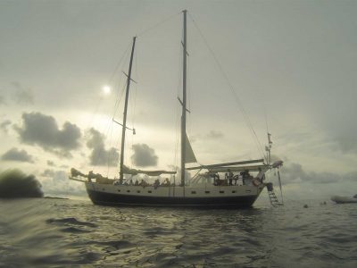 A sunset sailing cruise on a cloudy day at sea in Playa Grande, Costa Rica